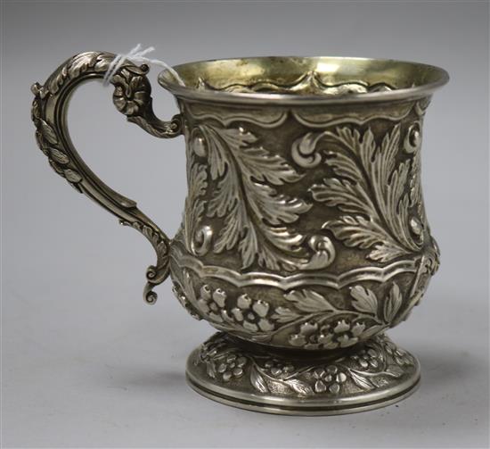 A William IV silver baluster-shaped Christening mug, embossed with flowers and leaves